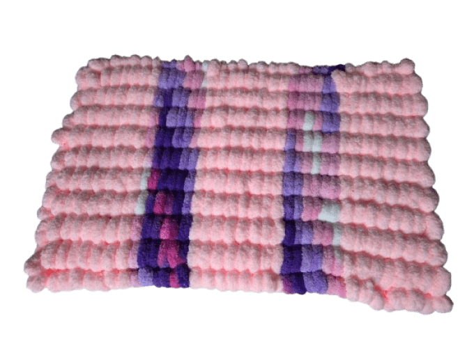 Tapis de caisse pompons